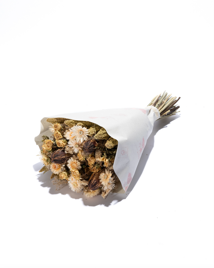 Farmhouse large dried flower bouquet in cream and tan neutrals, wrapped in paper