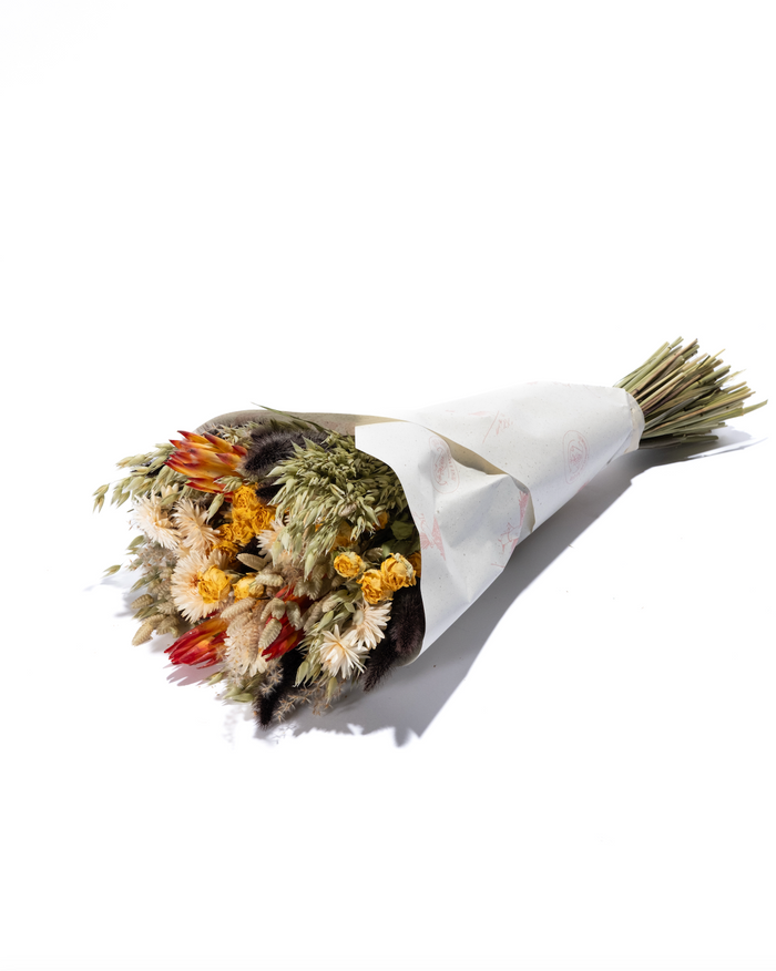 King's Day large dried flower bouquet in orange, red and cream, wrapped in paper