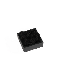 Bloombox of nine preserved roses in a square box