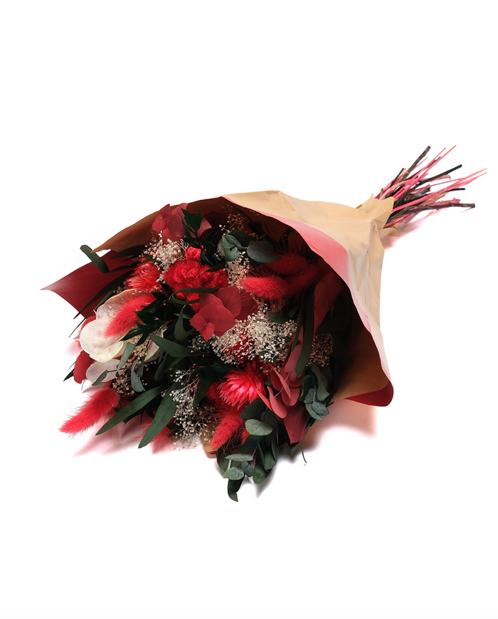 Primavera Red dried flower bouquet in deep red, wrapped in paper