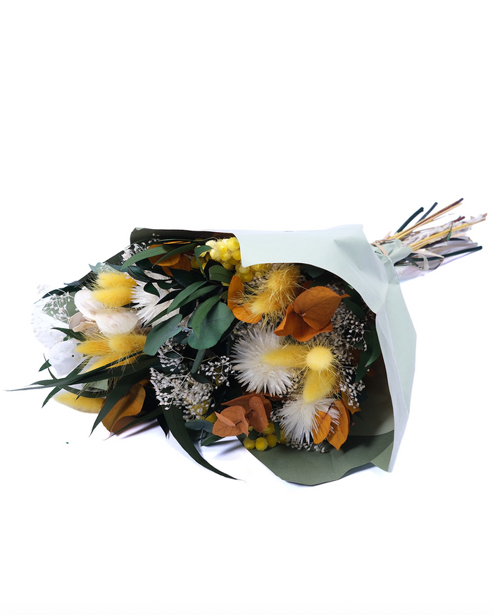 Primavera Yellow dried flower bouquet in yellow and green, wrapped in paper